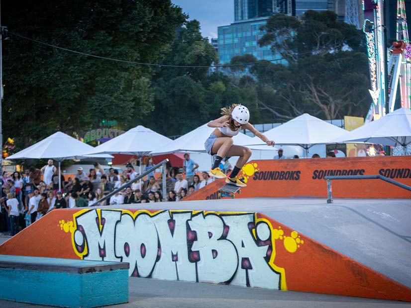 Woman skateboarding jump Moomba festival
